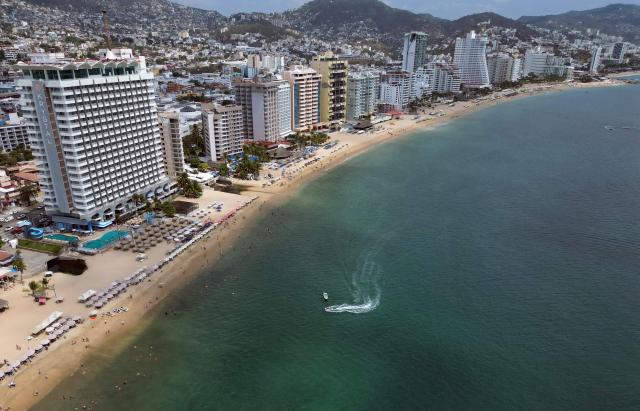 Aerial view of the Acapulco beach, Guerrero state, Mexico on February 28, 2026. (Photo by Alfredo ESTRELLA / AFP)