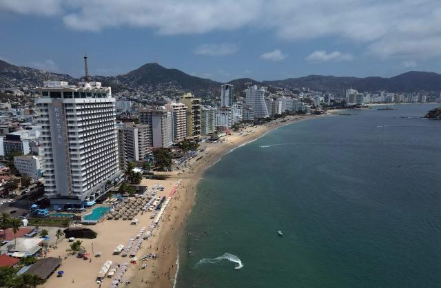 Aerial view of the Acapulco beach, Guerrero state, Mexico on February 28, 2026. (Photo by Alfredo ESTRELLA / AFP)