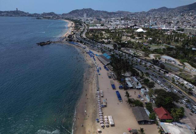 Aerial view of the Acapulco beach, Guerrero state, Mexico on February 28, 2026. (Photo by Alfredo ESTRELLA / AFP)