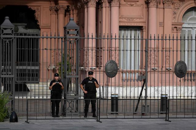 Members of Argentina’s federal police guard the presidential palace Casa Rosada as part of heightened security in Buenos Aires on February 28, 2026. Argentina went on high alert on February 28 after the US and Israeli attacks on Iran and the latter's retaliatory strikes. The heightened alert in Argentina involves "all the country's sensitive targets, critical infrastructure and the Jewish community," President Javier Milei's office said in a statement. (Photo by Luis ROBAYO / AFP)