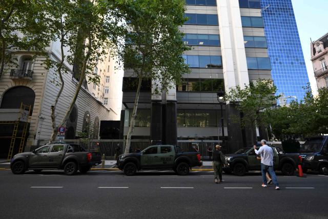Members of Argentina's Special Forces police guard the Israel Embassy as part of heightened security in Buenos Aires on February 28, 2026. Argentina went on high alert on February 28 after the US and Israeli attacks on Iran and the latter's retaliatory strikes. The heightened alert in Argentina involves "all the country's sensitive targets, critical infrastructure and the Jewish community," President Javier Milei's office said in a statement. (Photo by Luis ROBAYO / AFP)
