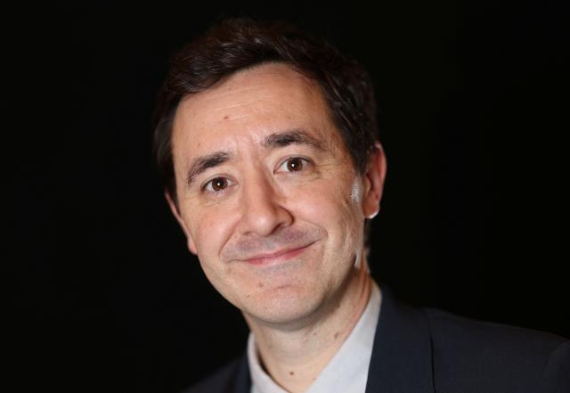 (FILES) US screenwriter Will Tracy whose movie "Bugonia" is nominated for Best Adapted Screenplay poses during a photo session ahead of the 98th Oscars Nominees Luncheon at the Beverly Hilton hotel in Beverly Hills, California on February 10, 2026. If there's one thing the 21st century has in spades, it's conspiracy theorists -- angry, unhinged people hacking at their keyboards about grievances real and imagined. But when screenwriter Will Tracy sat down to pen his Oscar-nominated script for "Bugonia," he wanted to create a conspiracy theorist with a little more nuance. (Photo by VALERIE MACON / AFP)