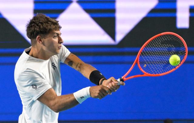 Italy's Flavio Cobolli returns to US' Frances Tiafoe during the 2026 Mexico ATP 500 Tennis Open men's singles tennis final match at the Arena GNP Seguros in Acapulco, Guerrero State, Mexico on February 28, 2026. (Photo by Alfredo ESTRELLA / AFP)