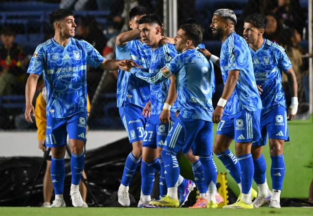 Tigres' defender #27 Jesus Angulo celebrates with teammates after scoring his team's second goal during the Liga MX Clausura tournament football match between America and Tigres at the Ciudad de los Deportes Stadium in Mexico City on February 28, 2026. (Photo by Yuri CORTEZ / AFP)