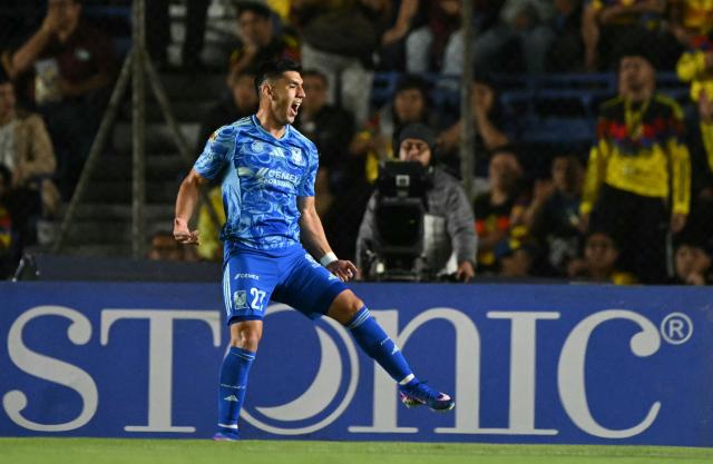 Tigres' defender #27 Jesus Angulo celebrates after scoring his team's second goal during the Liga MX Clausura tournament football match between America and Tigres at the Ciudad de los Deportes Stadium in Mexico City on February 28, 2026. (Photo by Yuri CORTEZ / AFP)
