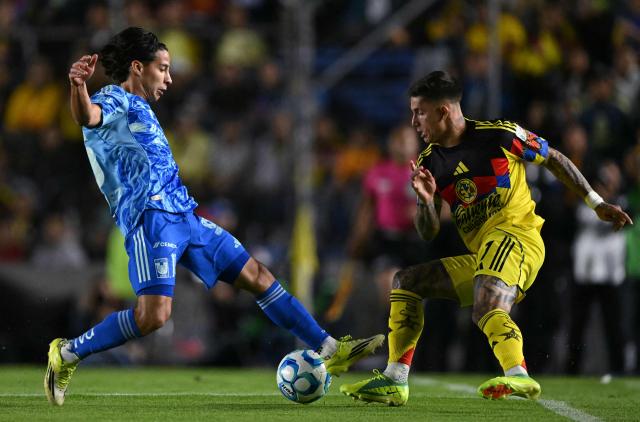 Tigres' midfielder #16 Diego Lainez and America's Uruguayan midfielder #07 Brian Rodriguez fight for the ball during the Liga MX Clausura tournament football match between America and Tigres at the Ciudad de los Deportes Stadium in Mexico City on February 28, 2026. (Photo by Yuri CORTEZ / AFP)