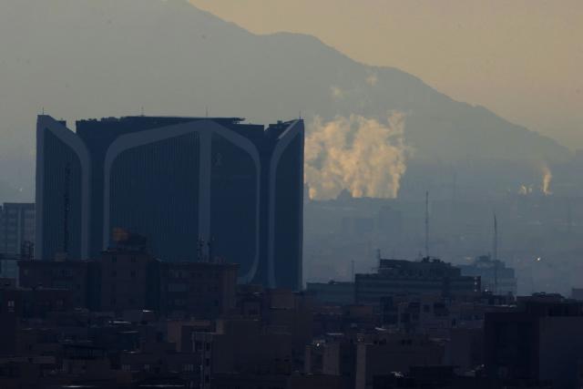 Plume of smokes rise from reported explosions in Tehran on March 1, 2026. US President Donald Trump said on February 28 that Iran's supreme leader Ayatollah Ali Khamenei was dead, after Israel and the United States launched an attack of unprecedented scale aimed at bringing down the Islamic republic. (Photo by ATTA KENARE / AFP)