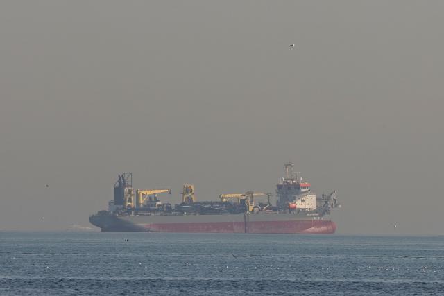 An oil tanker is pictured offshore in Dubai on March 1, 2026. As a fresh Middle East conflict risks sending oil prices sharply higher, Saudi Arabia, Russia and six other key members of the OPEC+ alliance are widely expected to announce an output increase March 1, analysts say. (Photo by Fadel SENNA / AFP)