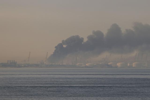 A plume of smoke rises from the port of Jebel Ali following a reported Iranian strike in Dubai on March 1, 2026. Fresh blasts were heard across the Gulf cities of Dubai, Doha and Manama on Sunday morning after a day of Iran strikes in the region in retaliation for US and Israeli attacks. (Photo by Fadel SENNA / AFP)
