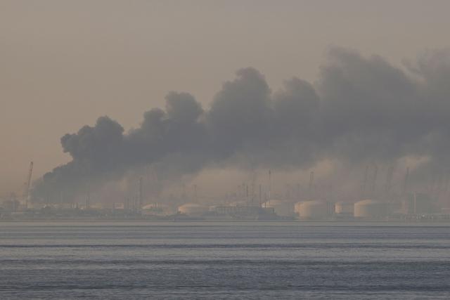 A plume of smoke rises from the port of Jebel Ali following a reported Iranian strike in Dubai on March 1, 2026. Fresh blasts were heard across the Gulf cities of Dubai, Doha and Manama on Sunday morning after a day of Iran strikes in the region in retaliation for US and Israeli attacks. (Photo by Fadel SENNA / AFP)