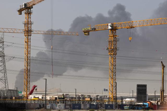 A plume of smoke rises from the port of Jebel Ali following a reported Iranian strike in Dubai on March 1, 2026. Ayatollah Ali Khamenei, Iran's supreme leader since 1989 and sworn enemy of the West, was killed in the opening salvo of a massive US and Israeli attack, sparking a new wave of retaliatory missile strikes from Tehran on March 1. (Photo by Fadel SENNA / AFP)