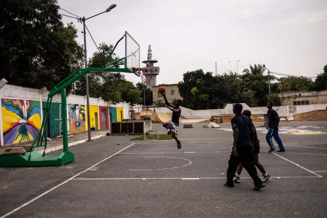 Basketball players compete during a game at the One Nation Skatepark in Lome on February 28, 2026. (Photo by OLYMPIA DE MAISMONT / AFP)