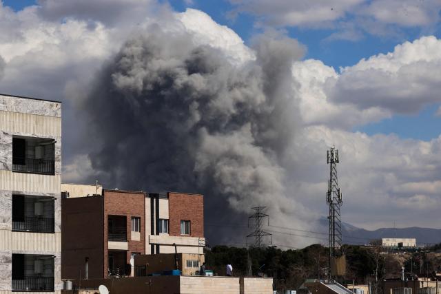 A plume of smoke rises following reported explosions in Tehran on March 1, 2026. Ayatollah Ali Khamenei, Iran's supreme leader since 1989 and sworn enemy of the West, was killed in the opening salvo of a massive US and Israeli attack, sparking a new wave of retaliatory missile strikes from Tehran on March 1. (Photo by ATTA KENARE / AFP)