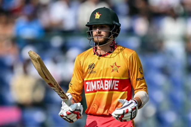 Zimbabwe's Brian Bennett reacts as he walks back to the pavilion after his dismissal during the 2026 ICC Men's T20 Cricket World Cup Super Eights match between Zimbabwe and South Africa at the Arun Jaitley Stadium in New Delhi on March 1, 2026. (Photo by Sajjad HUSSAIN / AFP)