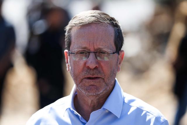 srael’s President Isaac Herzog speaks to the media as he visits an area hit by a reported overnight Iranian strike in Tel Aviv on March 1, 2026. Ayatollah Ali Khamenei, Iran's supreme leader since 1989 and sworn enemy of the West, was killed in the opening salvo of a massive US and Israeli attack, sparking a new wave of retaliatory missile strikes from Tehran on March 1. (Photo by Ilia YEFIMOVICH / AFP)