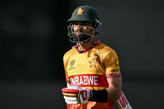 Zimbabwe's captain Sikandar Raza walks back to the pavilion after his dismissal during the 2026 ICC Men's T20 Cricket World Cup Super Eights match between Zimbabwe and South Africa at the Arun Jaitley Stadium in New Delhi on March 1, 2026. (Photo by Sajjad HUSSAIN / AFP)