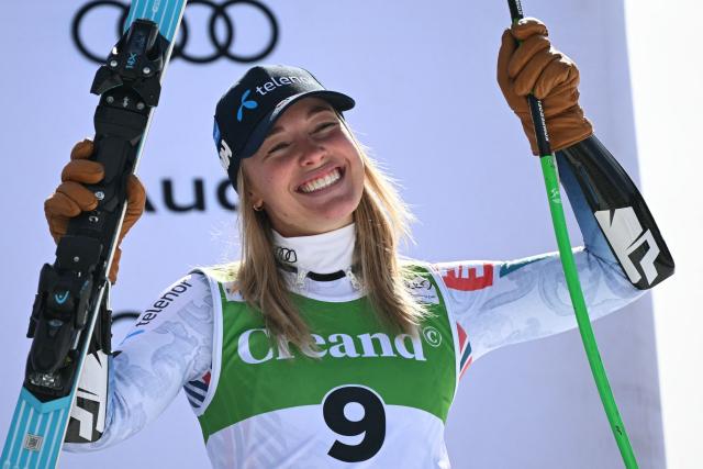 Third-placed Norway's Kajsa Vickhoff Lie celebrates on the podium after competing in the women's super G race, part of the FIS Alpine Ski World Cup 2025-2026 in Soldeu, Andorra on March 1, 2026. (Photo by Lionel BONAVENTURE / AFP)