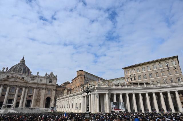 Pope Leo XIV addresses the crowd from the window of the apostolic palace overlooking St Peter's square during his Sunday Angelus prayer at the Vatican on March 1, 2026. (Photo by Alberto PIZZOLI / AFP)