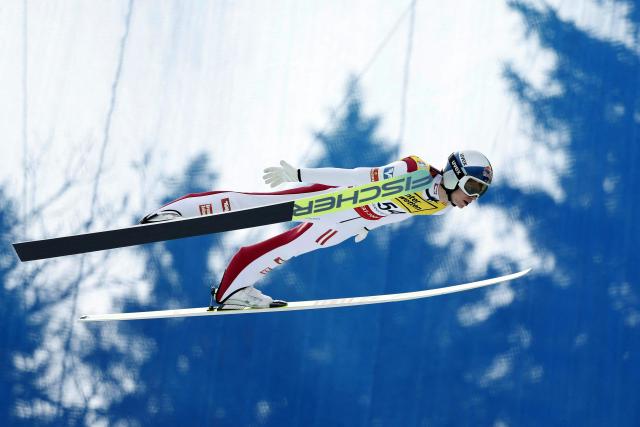 Austria's Stephan Embacher soars through the air during the qualification round of the Men Flying Hill Individual HS235 competition of the FIS Ski Jumping World Cup in Kulm Bad Mitterndorf, Austria, on March 1, 2026. (Photo by ERWIN SCHERIAU / APA / AFP) / Austria OUT