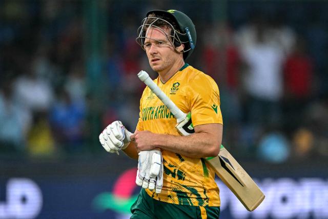 South Africa's David Miller walks back to the pavilion after his dismissal during the 2026 ICC Men's T20 Cricket World Cup Super Eights match between Zimbabwe and South Africa at the Arun Jaitley Stadium in New Delhi on March 1, 2026. (Photo by Sajjad HUSSAIN / AFP)