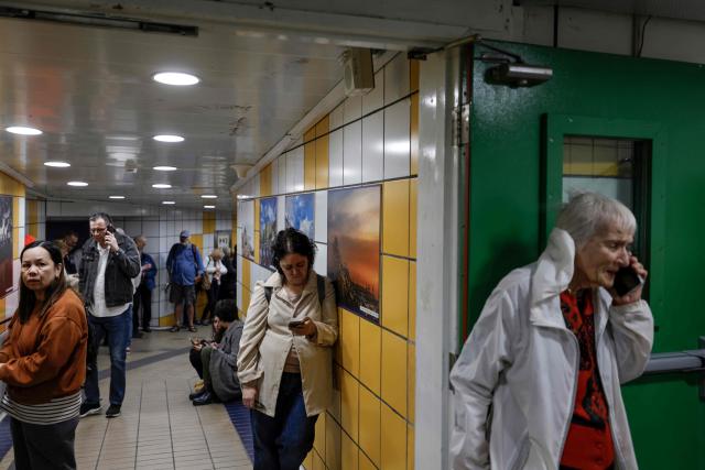 TOPSHOT - People take shelter in an underground station in Haifa on March 1, 2026, amid Iranian attack fears. Iran launched strikes across the Gulf on March 1 after vowing to avenge slain supreme leader Ayatollah Ali Khamenei, defying a threat from President Donald Trump to strike with unprecedented force. (Photo by Jalaa MAREY / AFP)