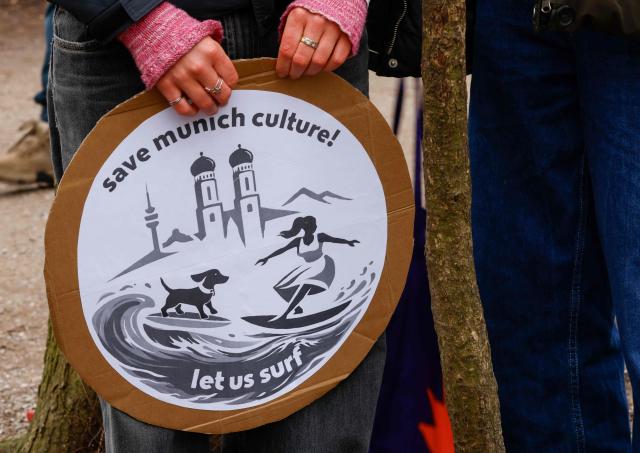 People take part in a demonstration against the closed wave called "Eisbachwelle" in Munich, Bavaria, southern Germany, on March 1, 2026. (Photo by Michaela STACHE / AFP)