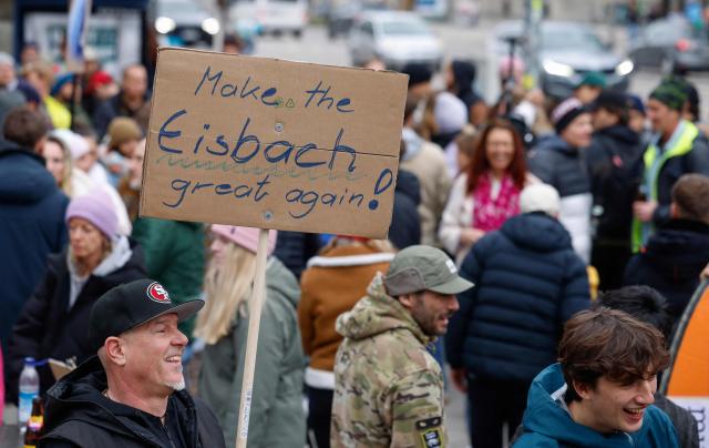 People take part in a demonstration against the closed wave called "Eisbachwelle" in Munich, Bavaria, southern Germany, on March 1, 2026. (Photo by Michaela STACHE / AFP)