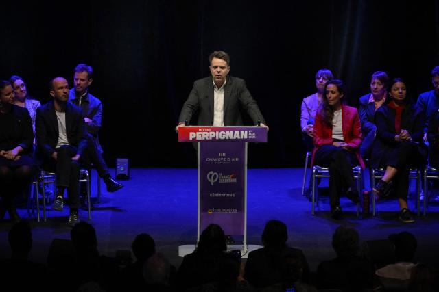 French leftist La France Insoumise (LFI) party Perpignan mayoral candidate Mickael Idrac delivers a speech during a campaign rally ahead of France's municipal elections, in Perpignan, southern France, on March 1, 2026. French voters head to the polls for municipal elections on March 15 and 22, 2026. (Photo by Ed JONES / AFP)