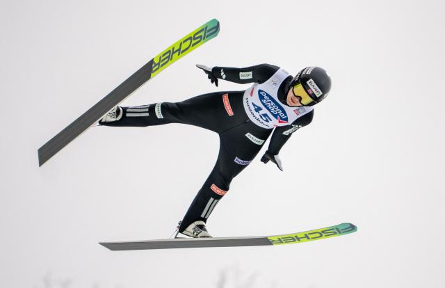 Norway's Anna Odine Stroem soars through the air during the Women's Individual HS90 competition at the FIS Ski Jumping World Cup in Hinzenbach, Austria, on March 1, 2026. (Photo by GEORG HOCHMUTH / APA / AFP) / Austria OUT