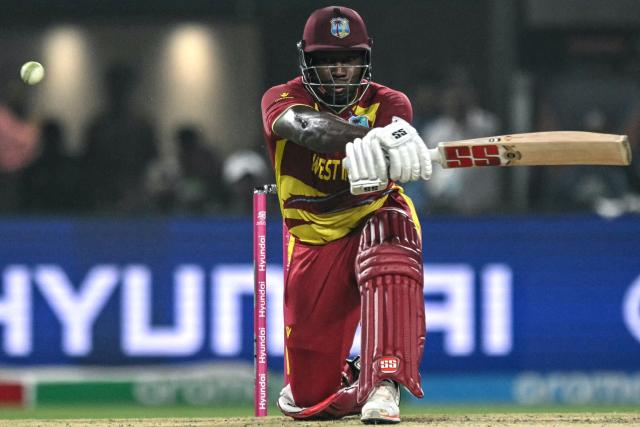 West Indies' Rovman Powell plays a shot during the 2026 ICC Men's T20 Cricket World Cup Super Eights match between India and West Indies at the Eden Gardens in Kolkata on March 1, 2026. (Photo by Arun SANKAR / AFP)
