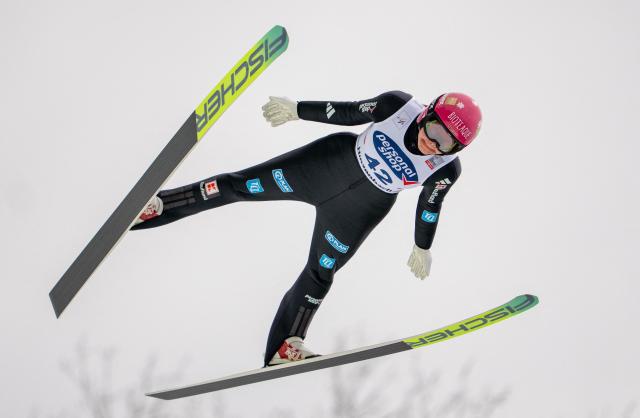 Germany's Agnes Reisch soars through the air during the Women's Individual HS90 competition at the FIS Ski Jumping World Cup in Hinzenbach, Austria, on March 1, 2026. (Photo by GEORG HOCHMUTH / APA / AFP) / Austria OUT