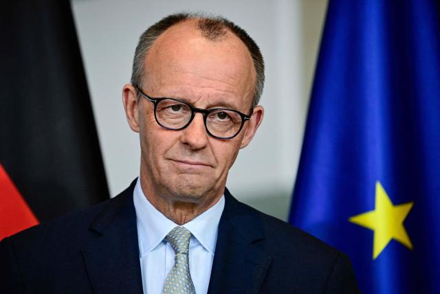 German Chancellor Friedrich Merz addresses a press conference on the situation in the Middle East at the Chancellery in Berlin on March 1, 2026.  (Photo by Tobias SCHWARZ / AFP)