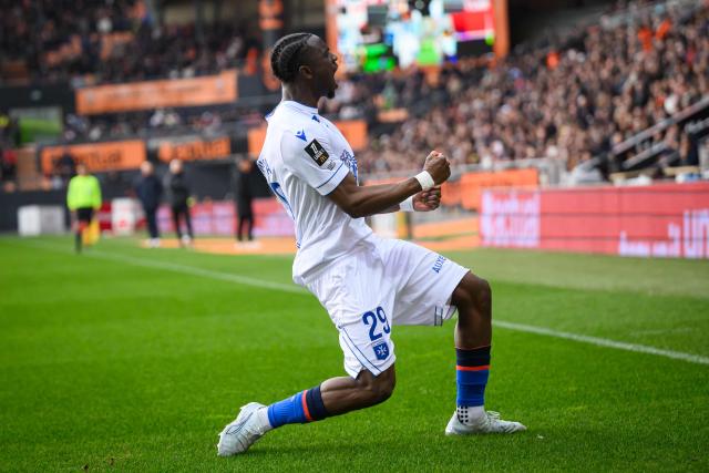 Auxerre's French defender #29 Marvin Senaya celebrates after scoring a goal during the French L1 football match between FC Lorient and AJ Auxerre at the Stade du Moustoir in Lorient, western France on March 1, 2026. (Photo by Loic VENANCE / AFP)