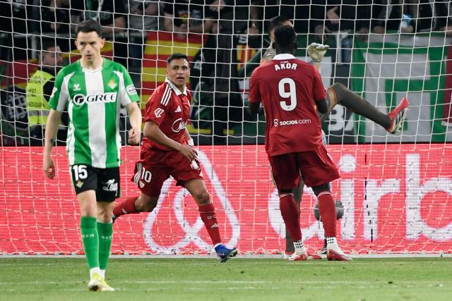 Sevilla's Chilean forward #10 Alexis Sanchez scores a goal during the Spanish league football match between Real Betis and Sevilla FC at Benito Villamarin Stadium in Seville on March 1, 2026. (Photo by CRISTINA QUICLER / AFP)