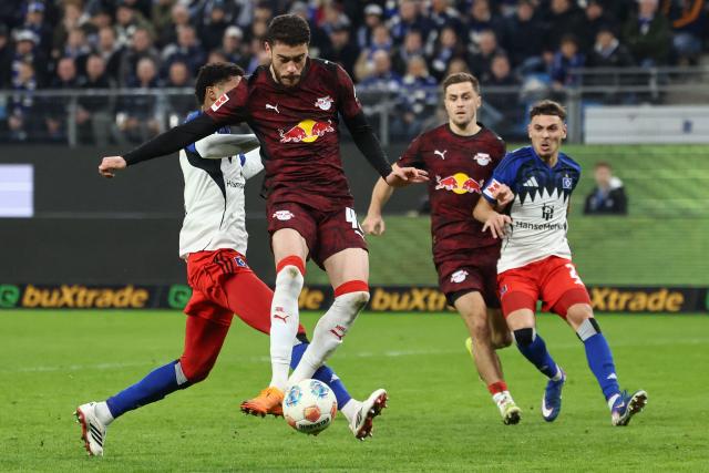 Leipzig's Brazilian forward #40 Romulo Cardoso controls the ball during the German first division Bundesliga football match between Hamburger SV and RB Leipzig in Hamburg, northern Germany on March 1, 2026. (Photo by IBRAHIM OT / AFP) / DFL REGULATIONS PROHIBIT ANY USE OF PHOTOGRAPHS AS IMAGE SEQUENCES AND/OR QUASI-VIDEO