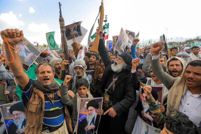 Mourners attend a memorial rally held by supporters of Yemen's Huthis a day after Iran's supreme leader was assassinated during a US and Israeli offensive on Tehran, in the Huthi-held capital Sanaa on March 1, 2026. The United States and Israel launched strikes against Iran on February 28, killing Iran's supreme leader and top military leaders, prompting authorities to retaliate with strikes on Israel and US bases across the Gulf. (Photo by Mohammed HUWAIS / AFP)