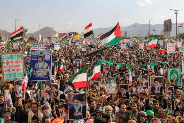 Mourners attend a memorial rally held by supporters of Yemen's Huthis a day after Iran's supreme leader was assassinated during a US and Israeli offensive on Tehran, in the Huthi-held capital Sanaa on March 1, 2026. The United States and Israel launched strikes against Iran on February 28, killing Iran's supreme leader and top military leaders, prompting authorities to retaliate with strikes on Israel and US bases across the Gulf. (Photo by Mohammed HUWAIS / AFP)
