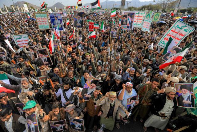 Mourners attend a memorial rally held by supporters of Yemen's Huthis a day after Iran's supreme leader was assassinated during a US and Israeli offensive on Tehran, in the Huthi-held capital Sanaa on March 1, 2026. The United States and Israel launched strikes against Iran on February 28, killing Iran's supreme leader and top military leaders, prompting authorities to retaliate with strikes on Israel and US bases across the Gulf. (Photo by Mohammed HUWAIS / AFP)