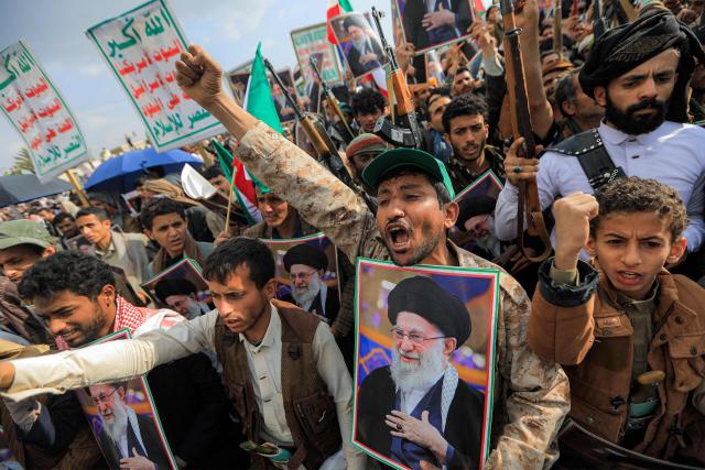 Mourners attend a memorial rally held by supporters of Yemen's Huthis a day after Iran's supreme leader was assassinated during a US and Israeli offensive on Tehran, in the Huthi-held capital Sanaa on March 1, 2026. The United States and Israel launched strikes against Iran on February 28, killing Iran's supreme leader and top military leaders, prompting authorities to retaliate with strikes on Israel and US bases across the Gulf. (Photo by Mohammed HUWAIS / AFP)