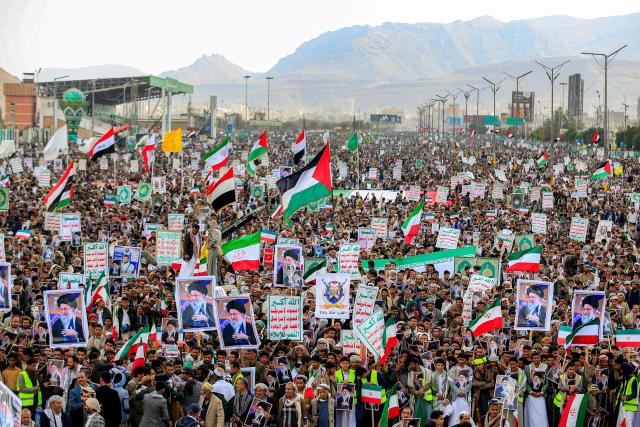 Mourners attend a memorial rally held by supporters of Yemen's Huthis a day after Iran's supreme leader was assassinated during a US and Israeli offensive on Tehran, in the Huthi-held capital Sanaa on March 1, 2026. The United States and Israel launched strikes against Iran on February 28, killing Iran's supreme leader and top military leaders, prompting authorities to retaliate with strikes on Israel and US bases across the Gulf. (Photo by Mohammed HUWAIS / AFP)