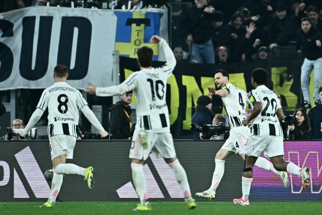 Juventus' Italian defender #04 Federico Gatti (2R) celebrates after scoring Juventus' third goal during the Italian Serie A football match between AS Roma and Juventus at the Olympic Stadium in Rome on March 1, 2026. (Photo by Filippo MONTEFORTE / AFP)