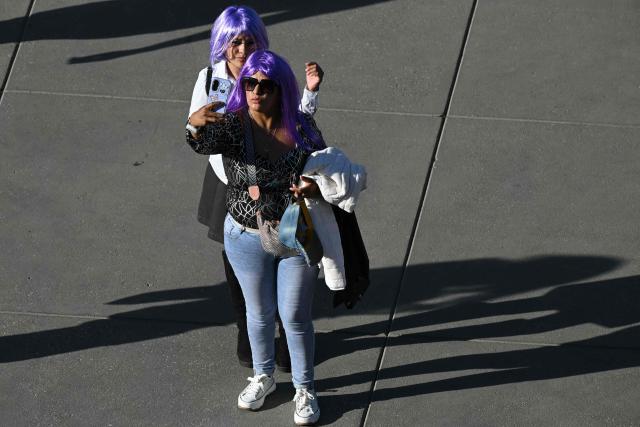 Fans of Colombian singer Shakira take a selfie before a free concert at Zocalo square in Mexico City on March 1, 2026. (Photo by Yuri CORTEZ / AFP)