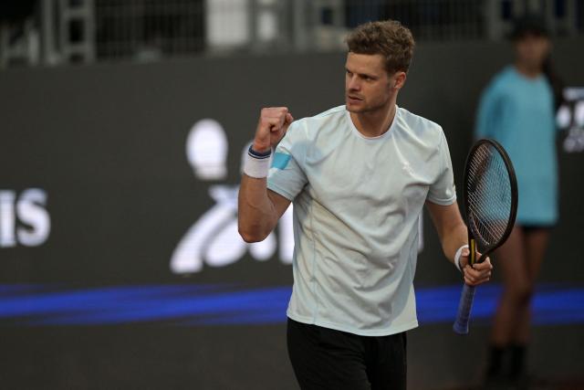 Germany's Yannick Hanfmann celebrates a point against Italy's Luciano Darderi during the ATP Santiago Open men's singles tennis final match at the Club San Carlos de Apoquindo in Santiago on March 1, 2026. (Photo by Rodrigo ARANGUA / AFP)