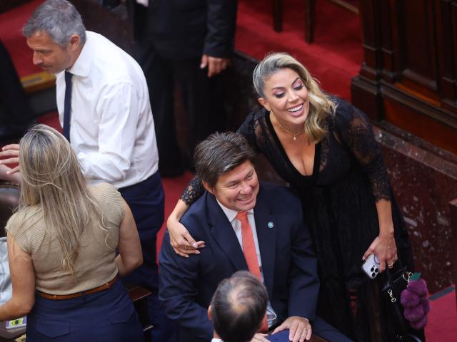 Argentina's Libertad Avanza ruling party deputy Virginia Gallardo smiles as she waits for the start of Argentina's President Javier Milei annual speech to parliament ahead of the inauguration of the 144th ordinary session of Congress in Buenos Aires on March 1, 2026. (Photo by ALEJANDRO PAGNI / AFP)