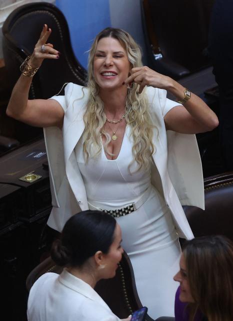 Argentina's Libertad Avanza ruling party deputy Karen Reichardt waits for the start of Argentina's President Javier Milei annual speech to parliament ahead of the inauguration of the 144th ordinary session of Congress in Buenos Aires on March 1, 2026. (Photo by ALEJANDRO PAGNI / AFP)