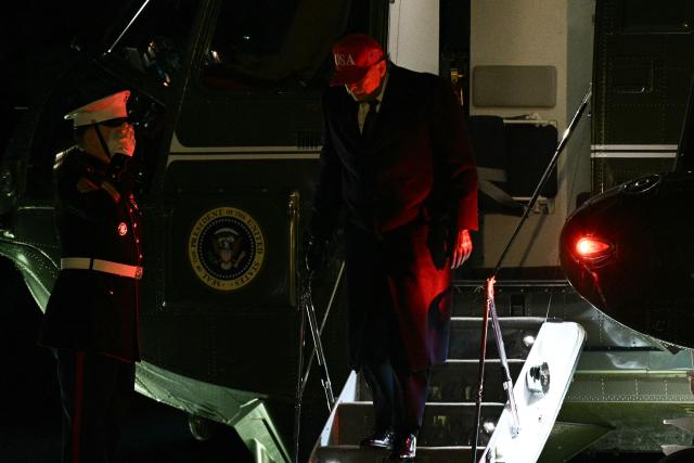 US President Donald Trump exits Marine One on the South Lawn upon returning to the White House in Washington, DC, on March 1, 2026. The United States and Israel launched massive bombardments against Iran and killed its supreme leader on February 28, with attacks ongoing Sunday. The US military on Sunday said three service members have been killed and five seriously wounded in the war against Iran -- the first casualties announced on the US side. (Photo by Brendan SMIALOWSKI / AFP)