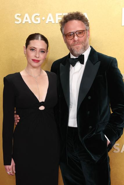 US actress, writer, and producer Lauren Miller and Canadian producer Seth Rogen attends the 32nd Annual Actor Awards at the Shrine Auditorium in Los Angeles on March 1, 2026. (Photo by Patrick T. Fallon / AFP)