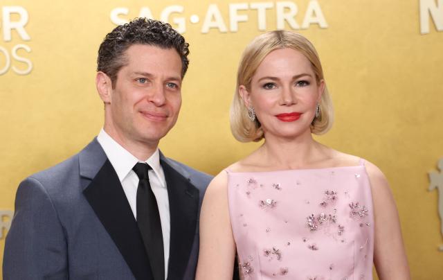 US actress Michelle Williams and her husband US musician and theatre director Thomas Kail attend the 32nd Annual Actor Awards at the Shrine Auditorium in Los Angeles on March 1, 2026. (Photo by Michael Tran / AFP)