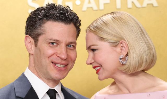 US actress Michelle Williams and her husband US musician and theatre director Thomas Kail attend the 32nd Annual Actor Awards at the Shrine Auditorium in Los Angeles on March 1, 2026. (Photo by Michael Tran / AFP)