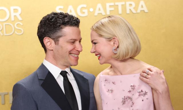 US actress Michelle Williams and her husband US musician and theatre director Thomas Kail attend the 32nd Annual Actor Awards at the Shrine Auditorium in Los Angeles on March 1, 2026. (Photo by Michael Tran / AFP)